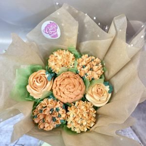 A beautiful bouquet of 7 piped flower cupcakes