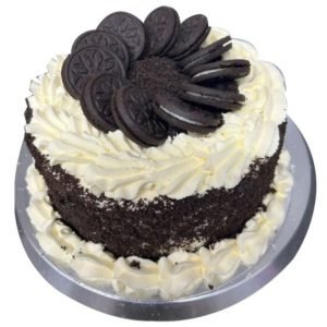 A picture of a cake with a crown of Oreo biscuits on top