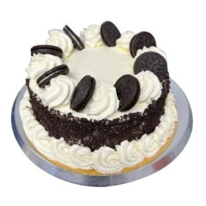 A cake topped with a circle of Oreo biscuits