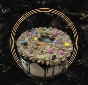 Chocolate Birthday Cake topped with Smarties made by The Bakers Shop Billesley, Birmingham