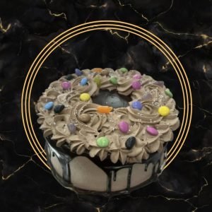 Chocolate Birthday Cake topped with Smarties made by The Bakers Shop Billesley, Birmingham